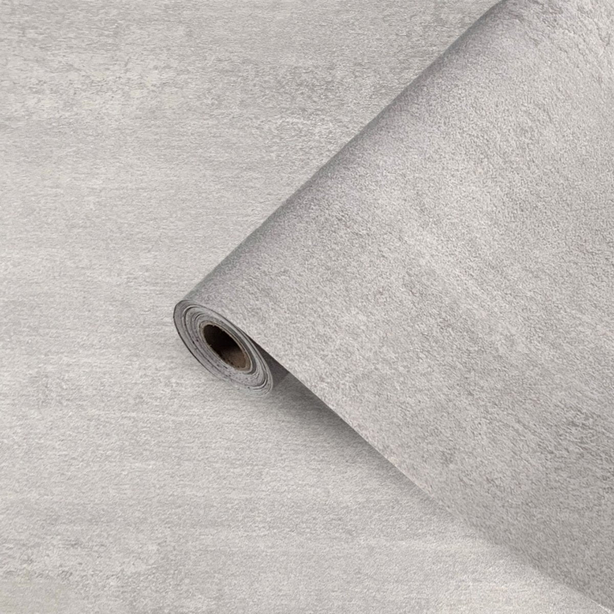 Rull med grå mikrosement kontaktplast – perfekt til vegg, møbler eller DIY-prosjekter.