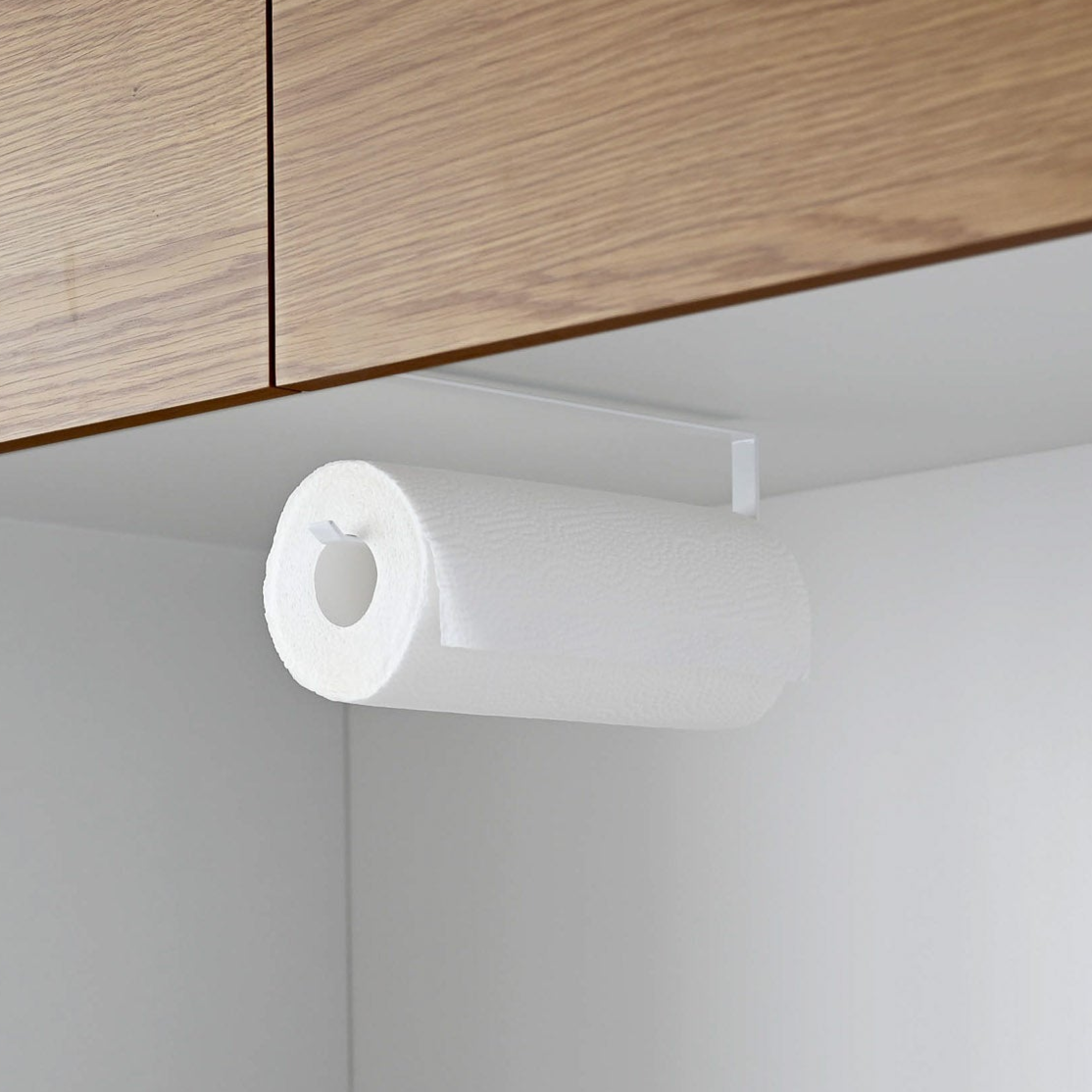 Tørkerullstativ til kjøkkenskap. Henges på hylle.