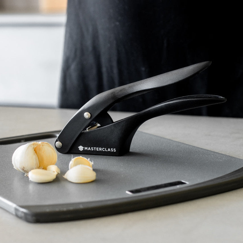 Ergonomisk hvitløkspresse med rustfrie skjæreblader