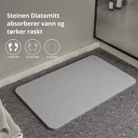 Grå diatomittmatte med informasjon om absorbering og hurtigtørking
