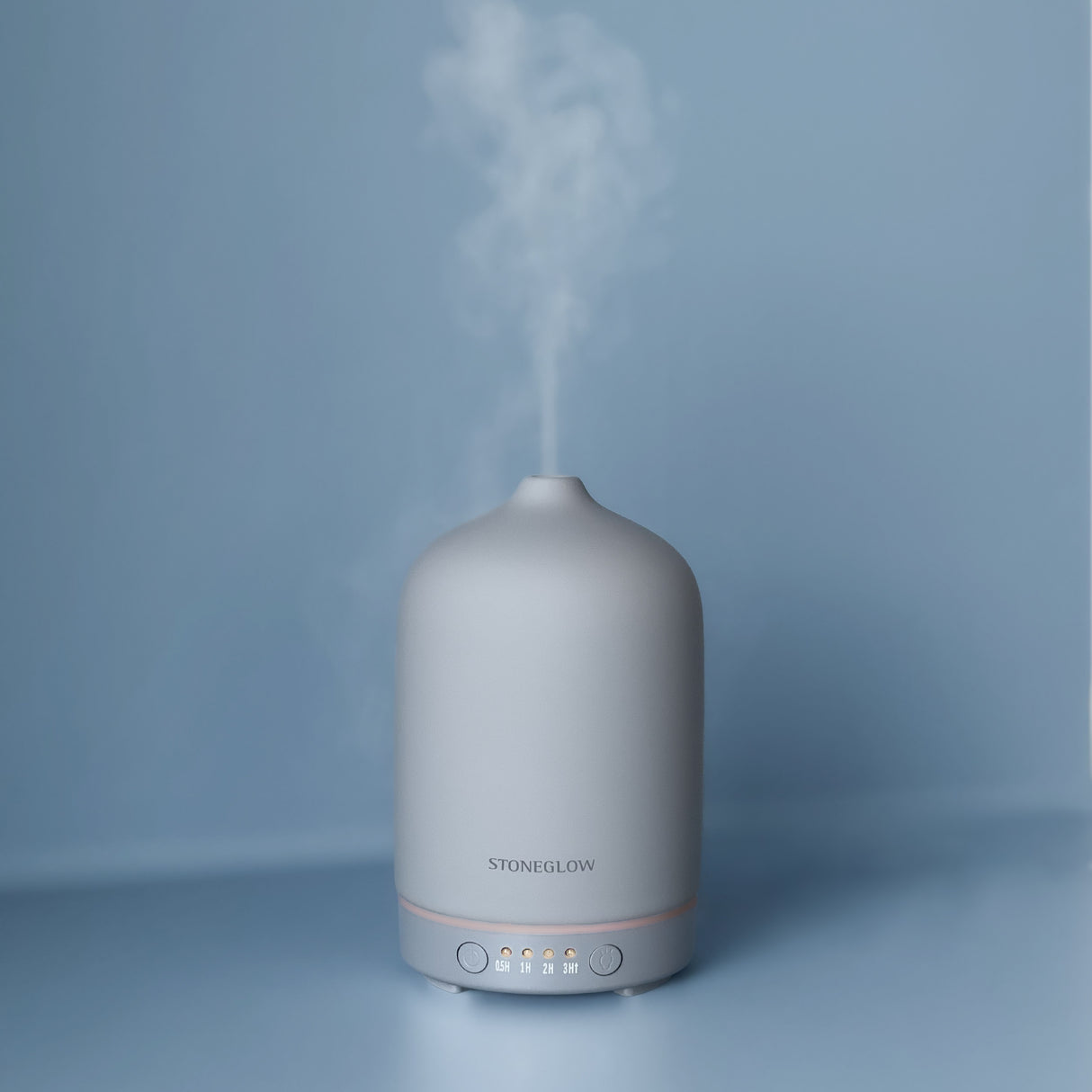 Moderne diffuser for eteriske oljer med innebygget timer og lys.