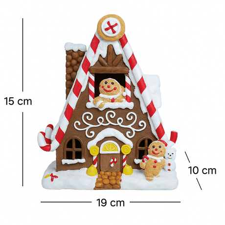 Pepparkakshus med måtten 19 × 15 × 10 cm, dekorerad med sockerrör, glasur och pepparkaksfigurer.