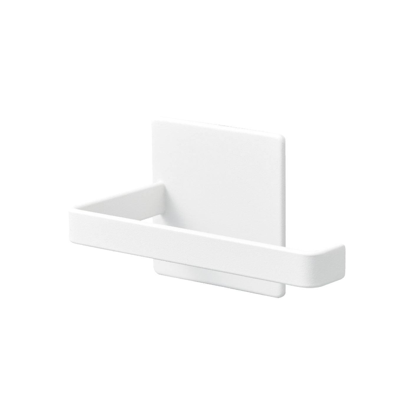 Dorullholder i hvit plast montert på vaskemaskin på badet.