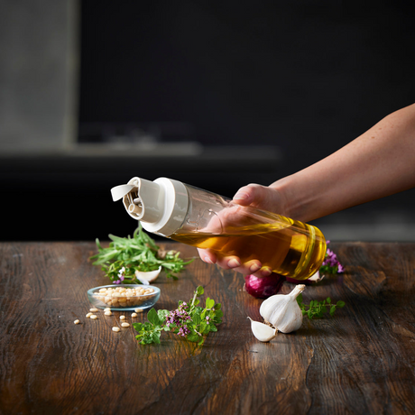 dispenser til matolje med enhåndsbetjening