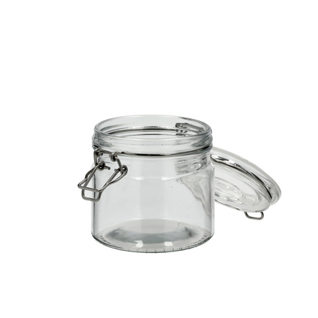 lite glass med lufttett lokk og metallklemme