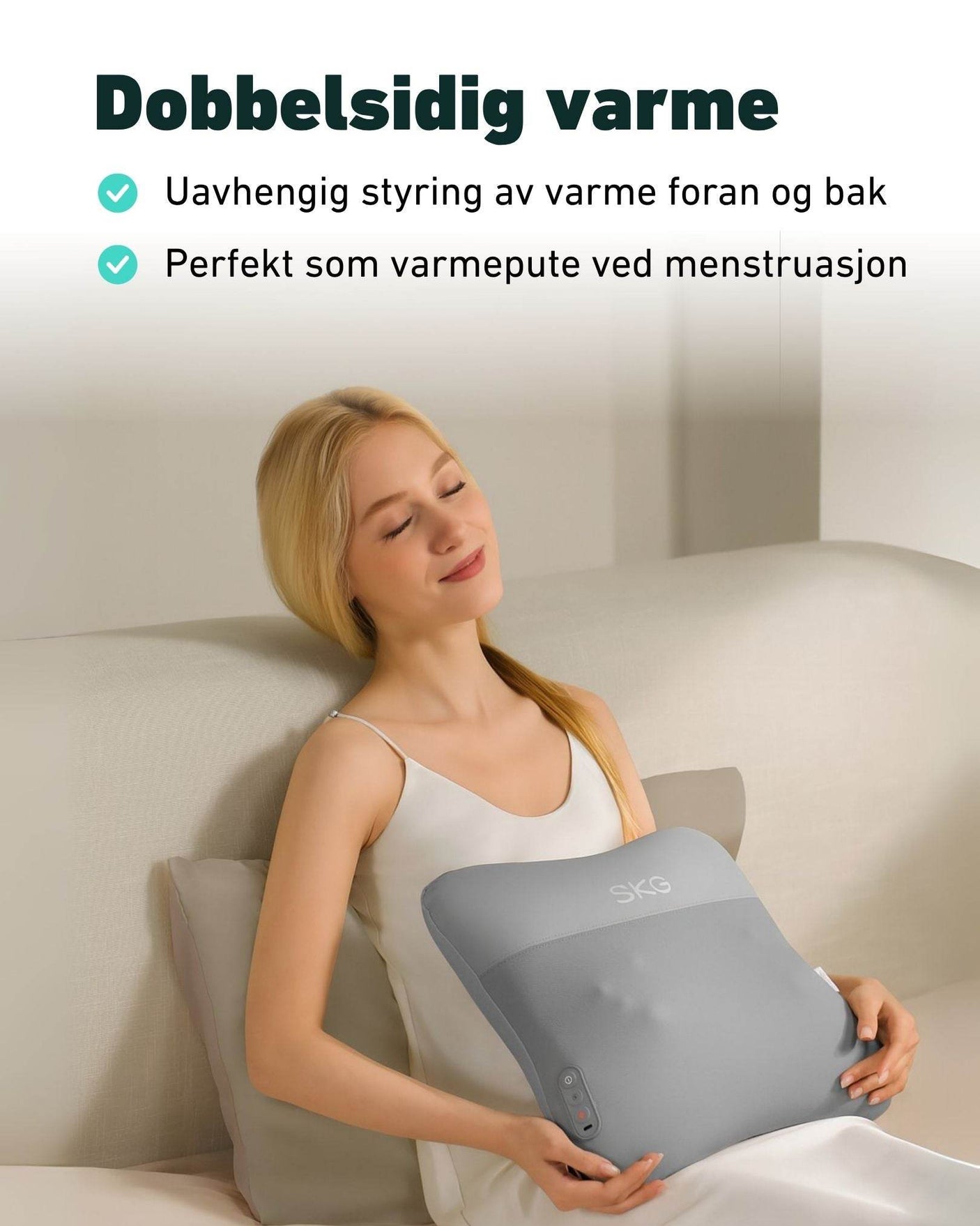 Kvinne bruker SKG VS500 som varmepute under menstruasjon – dobbeltsidig varme med individuell kontroll