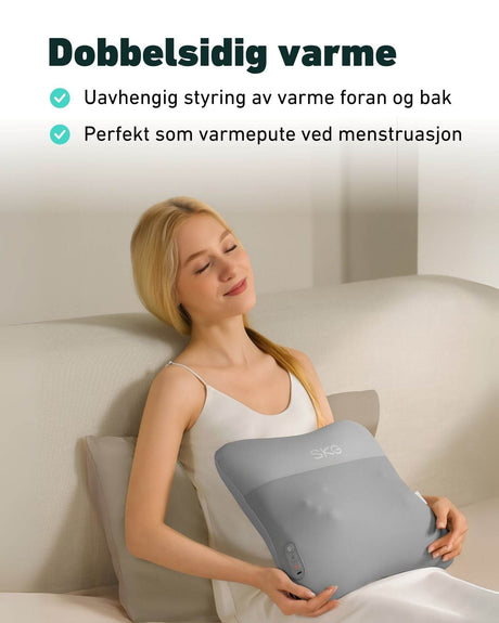 Kvinne bruker SKG VS500 som varmepute under menstruasjon – dobbeltsidig varme med individuell kontroll