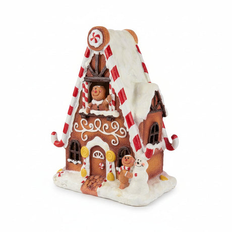 Pepparkakshus med glitterfinish - elegant julpynt till vardagsrum och skänk
