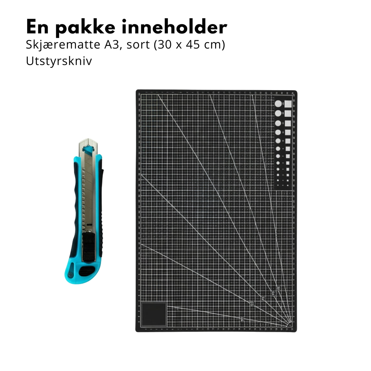 Verktøypakke med sort skjærematte A3 og utstyrskniv ovenfra med linjal og fliseklistremerker på hvitt trebord.

