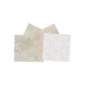 Vareprøvepakke av kontaktplast med beige steiner.