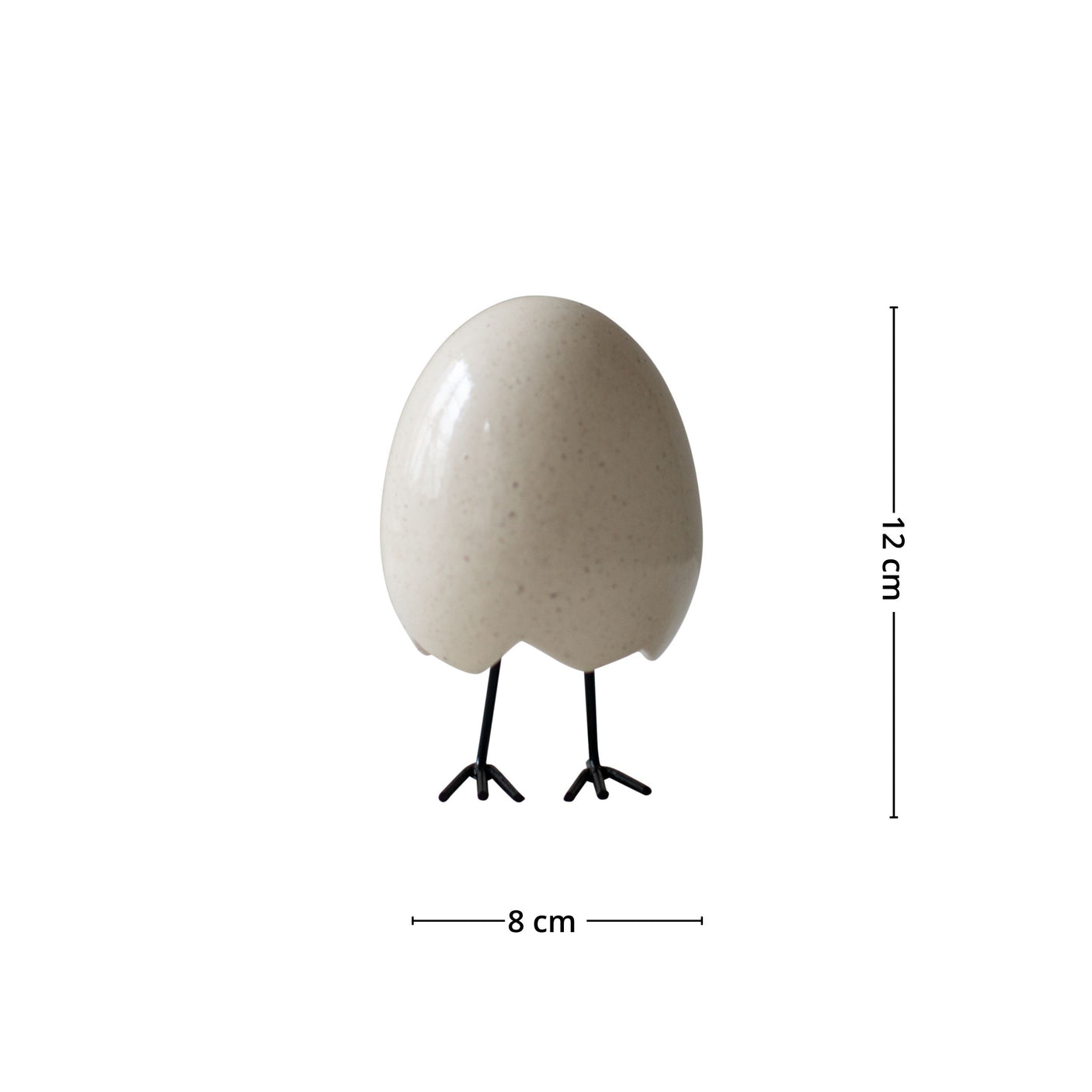 Liten interiørfigur formet som et egg med føtter, i nordisk minimalistisk stil.