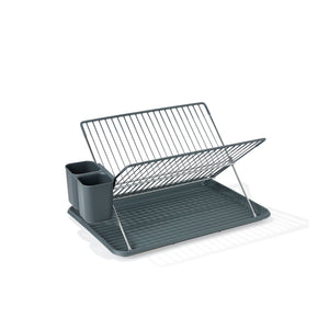 oppvaskstativ med avrenning som holder benken tørr