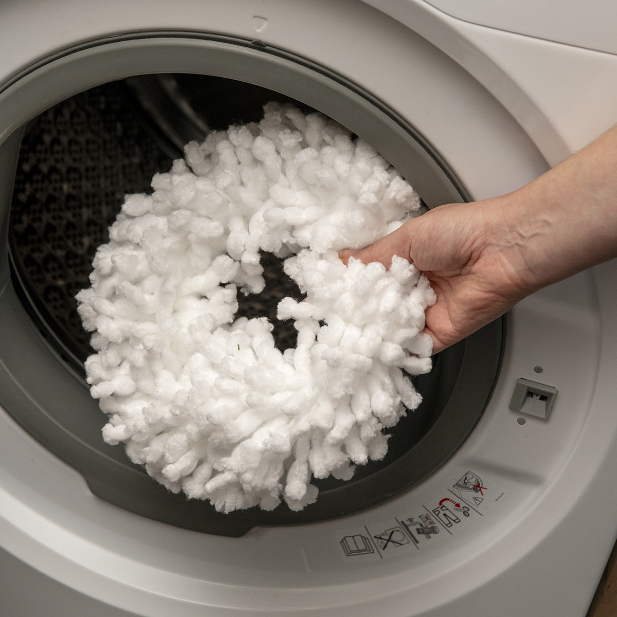 Moppesettet i bruk ved vask av gulv