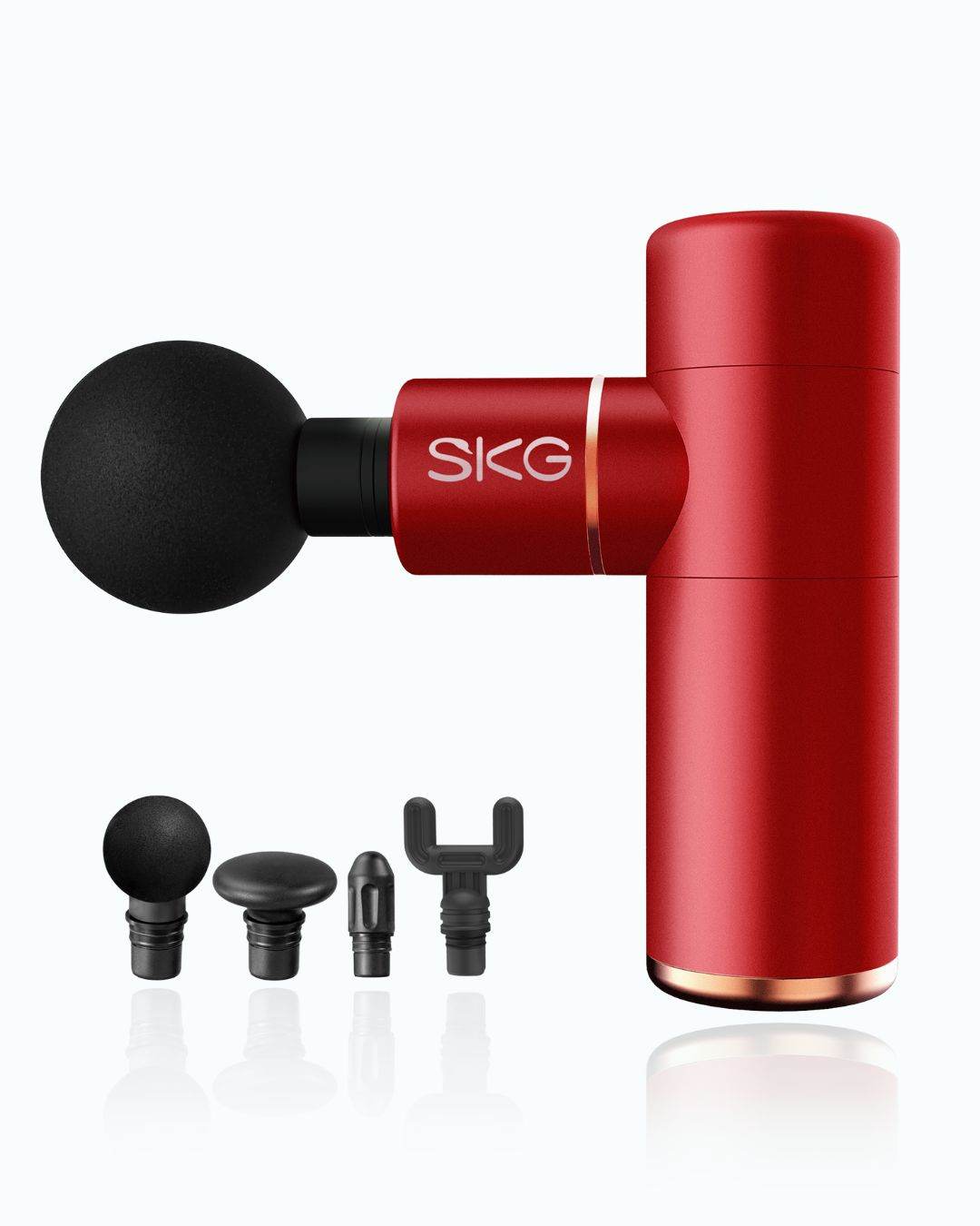 SKG F3-EN mini massasjepistol med fire massasjehoder og bærbart design