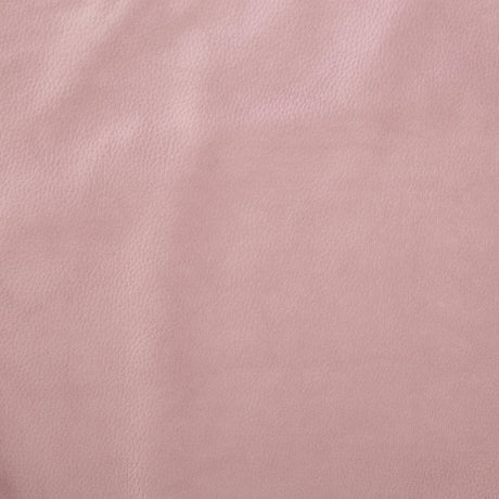 Närbild av ljungrosa putetrekk i velour med mjuk, strukturerad skinnlook