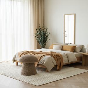 House Nordic Enna puff med rund form og fyldig overflate