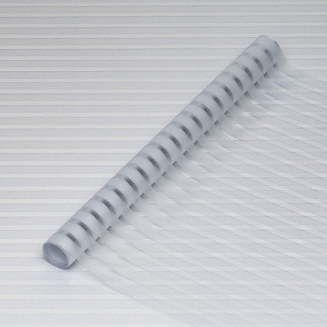 Vindusfolie med matt finish på glassdør mellom rom
