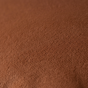 Dekorativt putetrekk i polyester med pelslook i varm cognac
