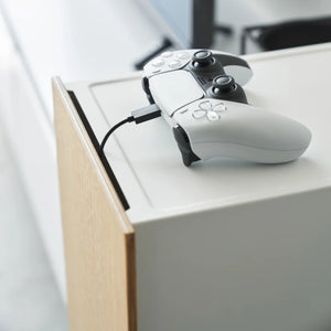 Oppbevaringsløsning til PlayStation og kontrollere med kabelholdere