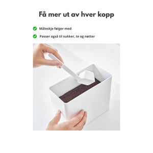 Kaffebeholder med måleskje og lufttett lokk for optimal oppbevaring av malt kaffe.