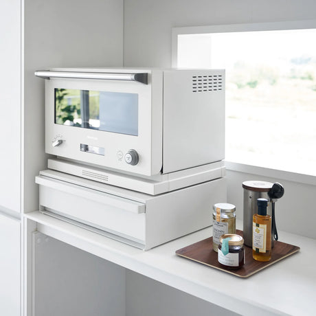 Oppbevaringsløsning til kjøkkenbenk med skuff under liten ovn eller apparat