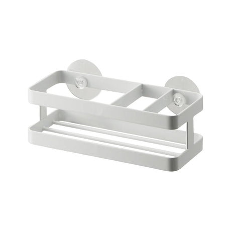 Organizer i hvitt stål til oppvaskmiddel og svamp ved vasken