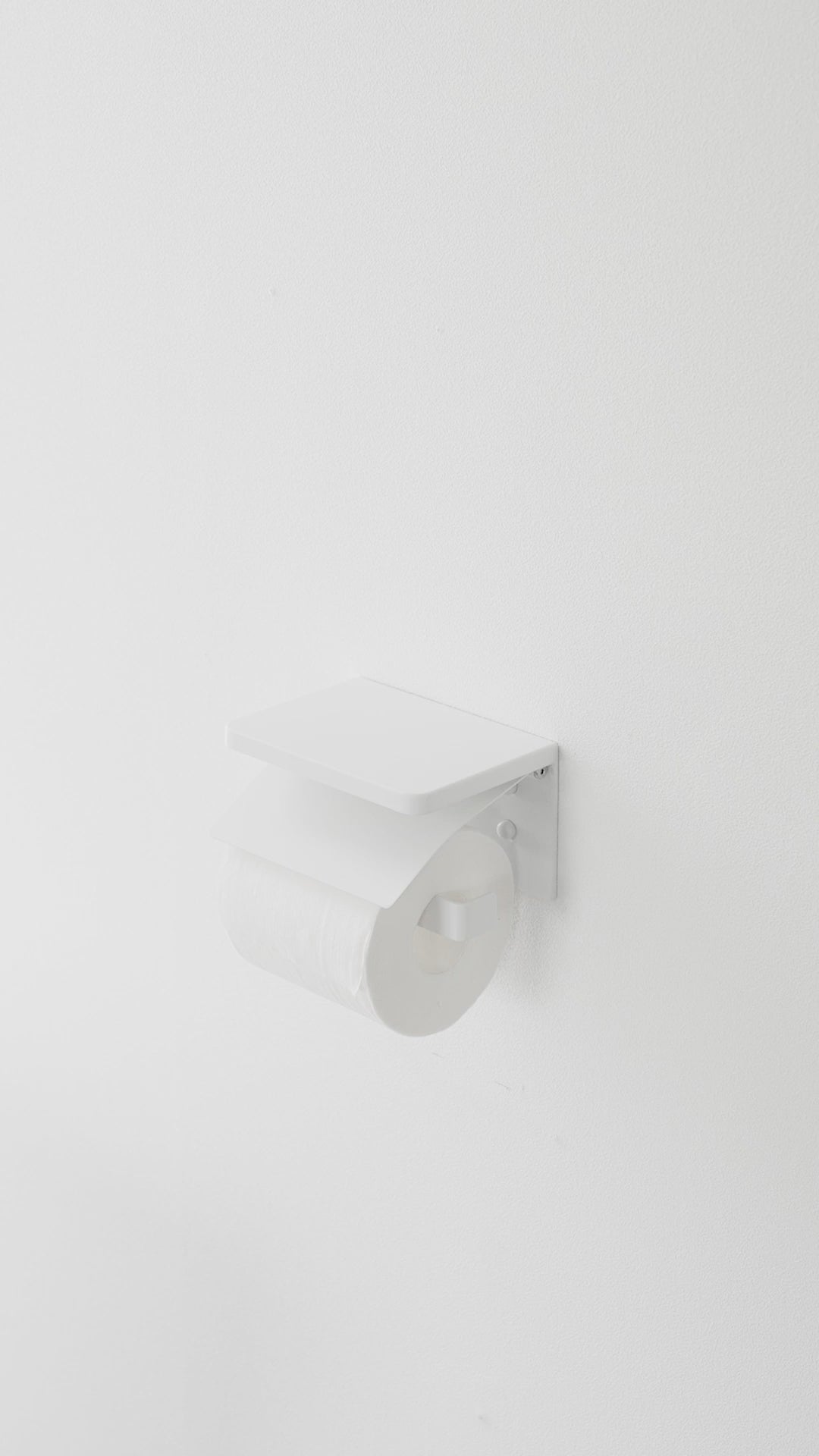 Veggmontert toalettpapirholder hvit