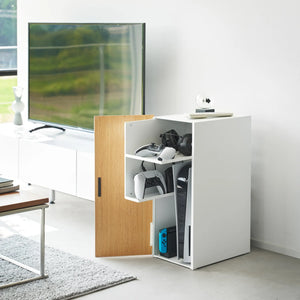 Hvit konsoll organizer med trepanel og smart rominndeling