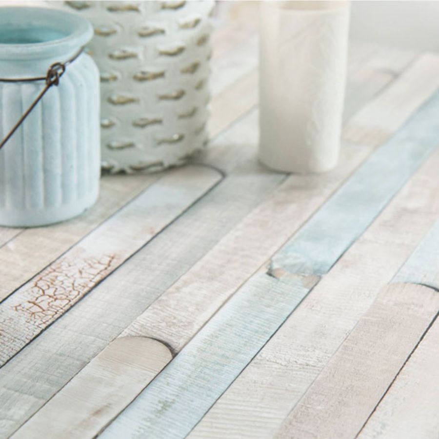 Rio ocean kontaktplast med drivved-design i pastellfarger, viser planke-mønster og kystinspirert stil